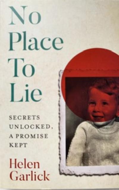 Title No Place to Lie by author Helen Garlick. Picture shows the author’s brother at age two in sepia from an old photograph, smiling. The image has a deep red circle intersecting the photograph and the cover, which colours the boy’s head. 