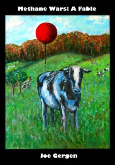 Cow in a field with a red balloon floating above 